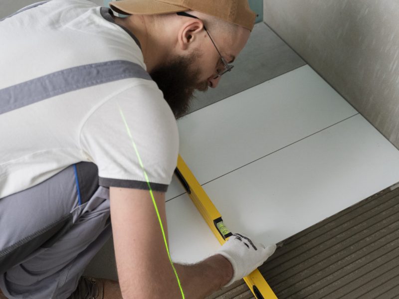 tiler-working-renovation-apartment